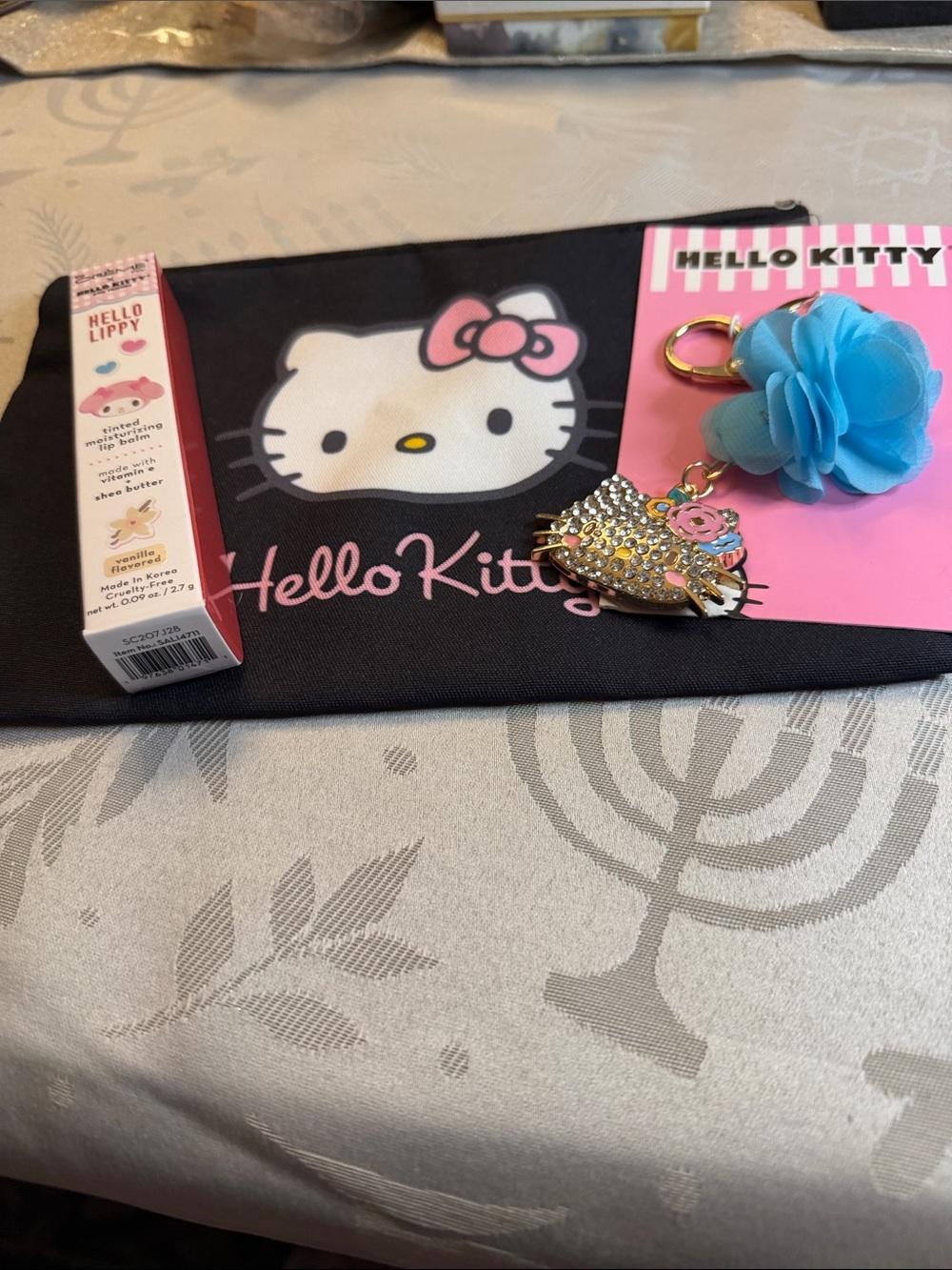Hello Kitty Black Pouch with Pink Bow and Blue Flower Keychain